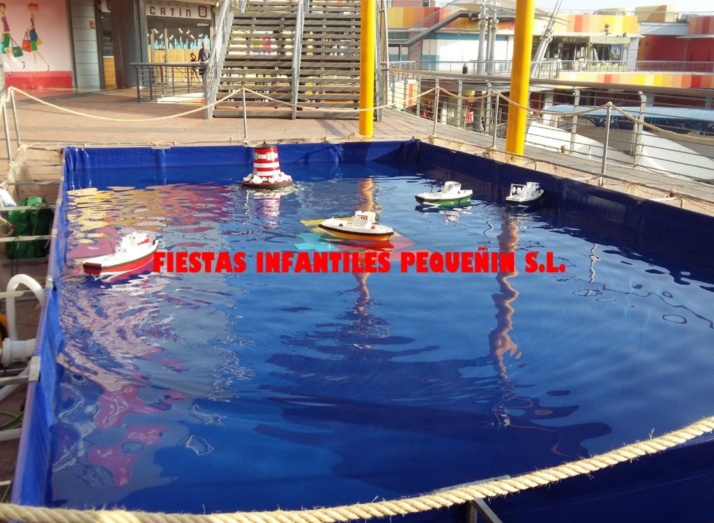 Piscina-con-barcas-teledirigidas